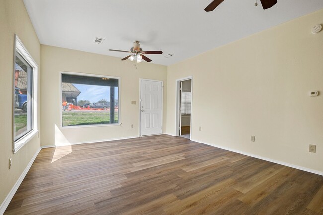 Building Photo - White picket fence cottage, ready to be your next home!