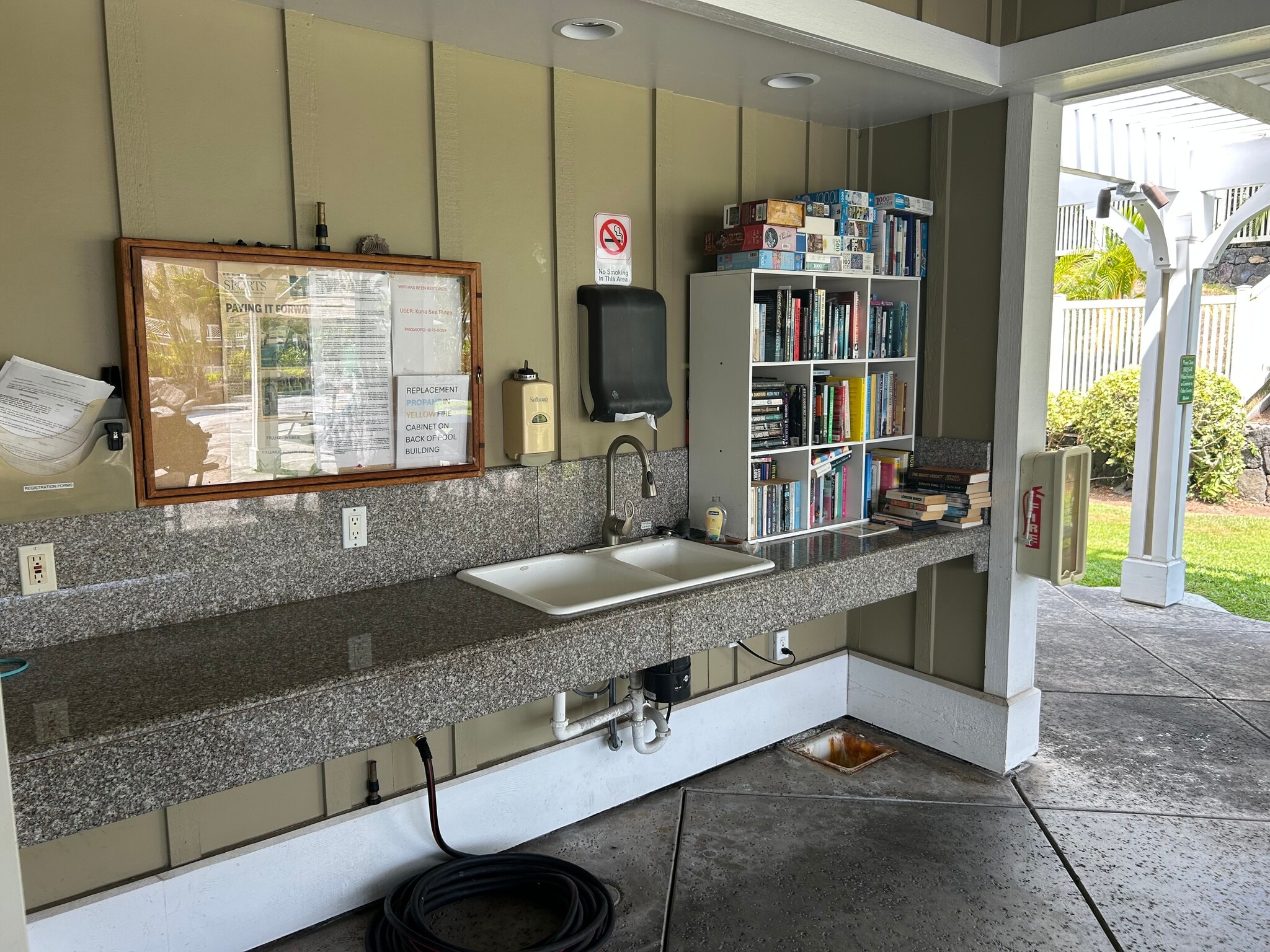 BBQ wash station and community book share library - 75-6009 Alii Dr