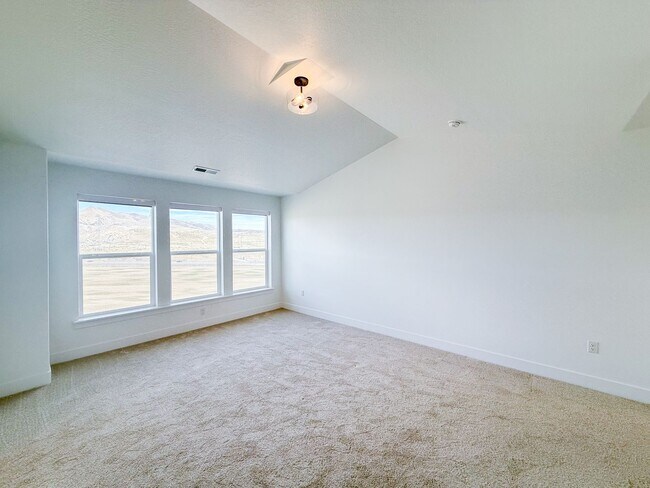 Building Photo - Spacious Family Home with Modern Upgrades