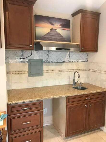 kitchenette available with electric stove for cooking - 4792 Mount Abbott St