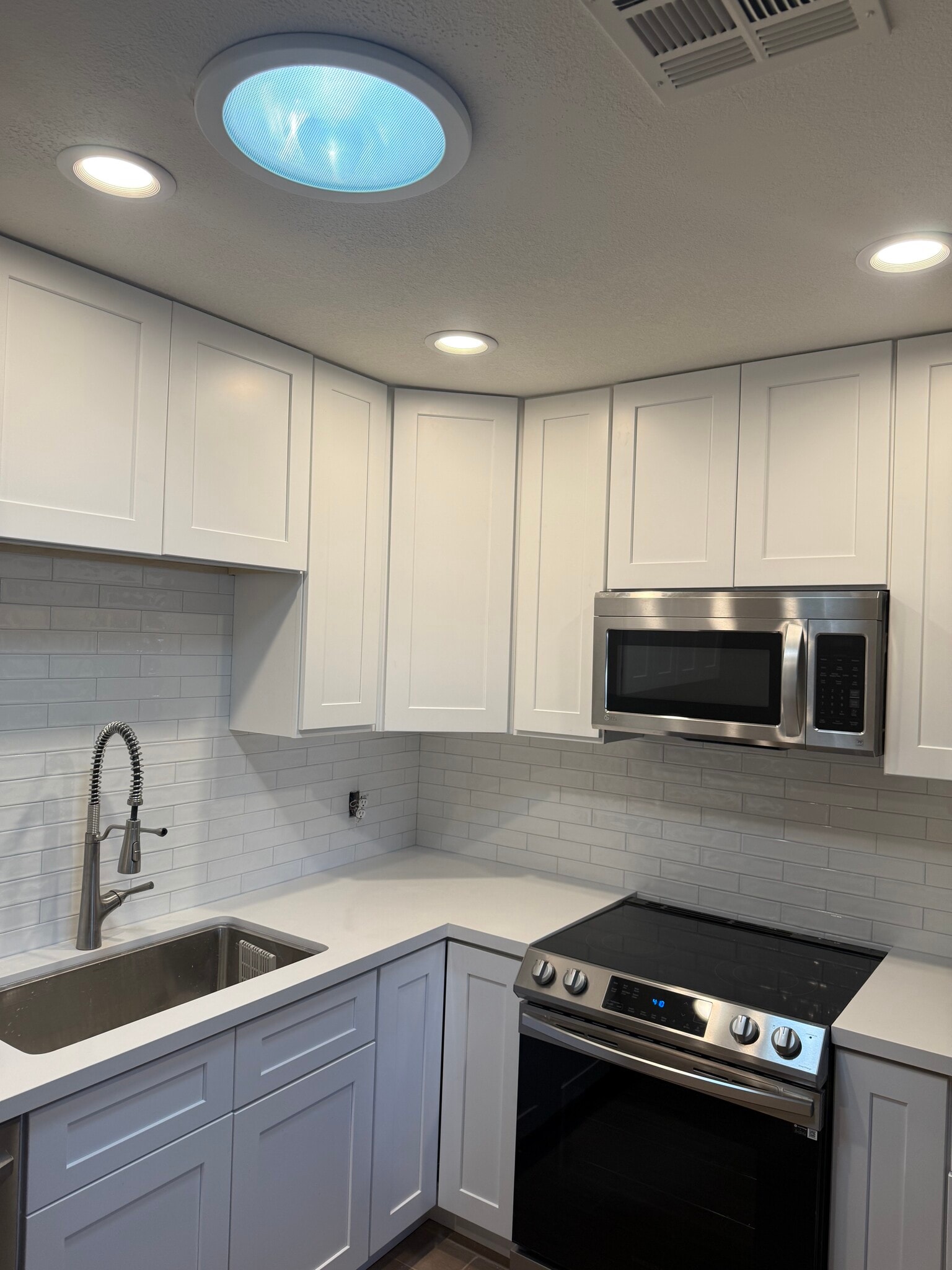 Built-in trash/recycle pull-out; spice rack built-in - 2513 N 28th St