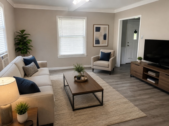 Building Photo - Adorable 2-Bedroom Gem: Fresh Floors & New Appliances!
