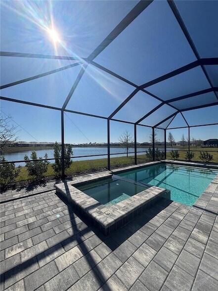 Building Photo - 7869 Lakes Edge Ln