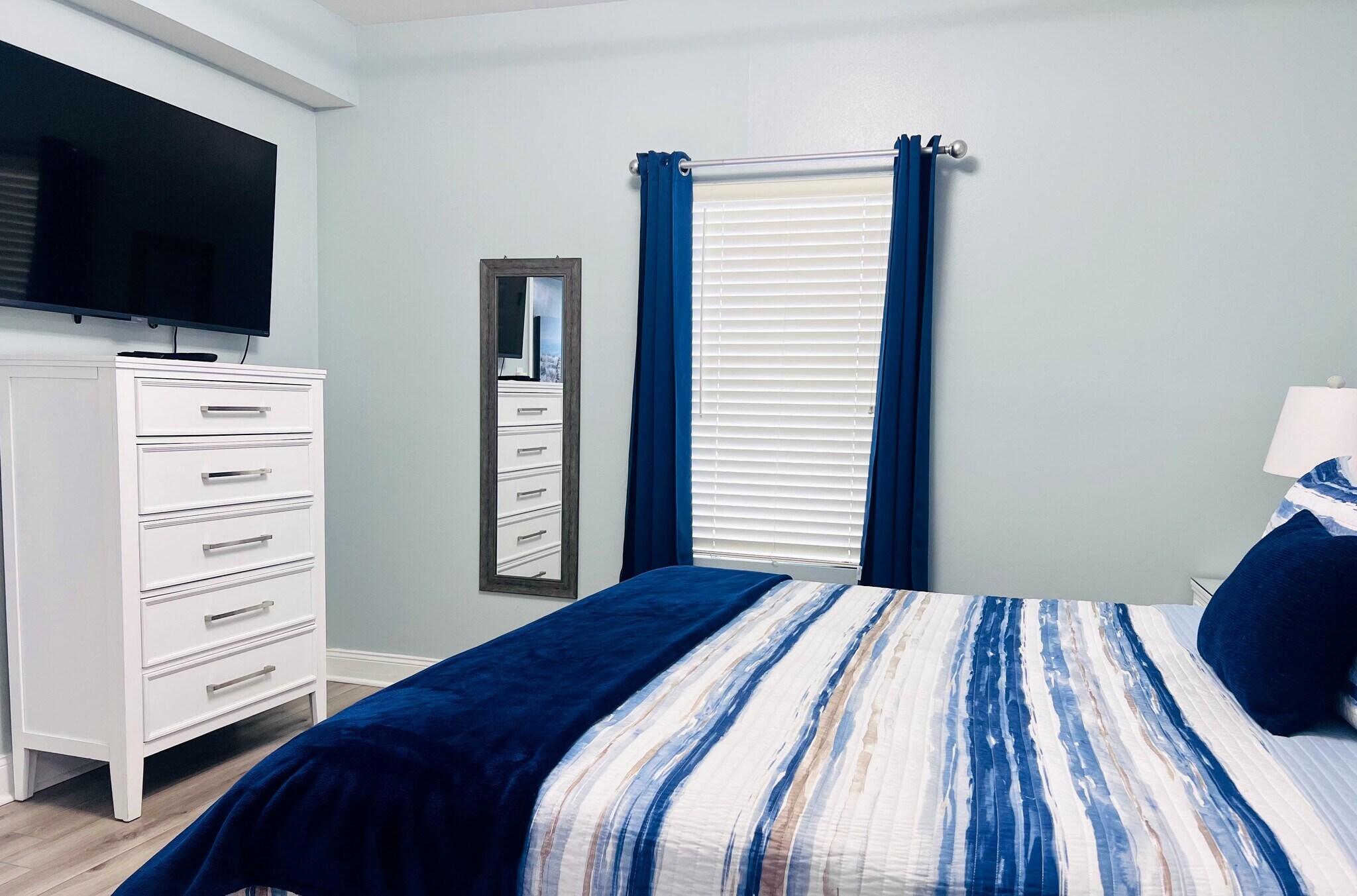 Enjoy a movie from the master on the flat screen TV - 9860 S Thomas Dr