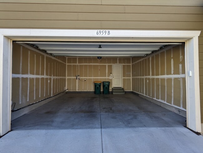 2-car garage leading into kitchen - 6959 Joyce Ln