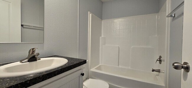 Building Photo - 55+ community Sylvan Grove / move in Special!