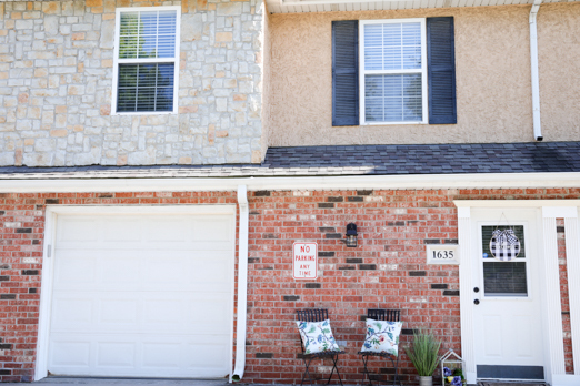 Front entrance and attached garage - 1635 E 120th St