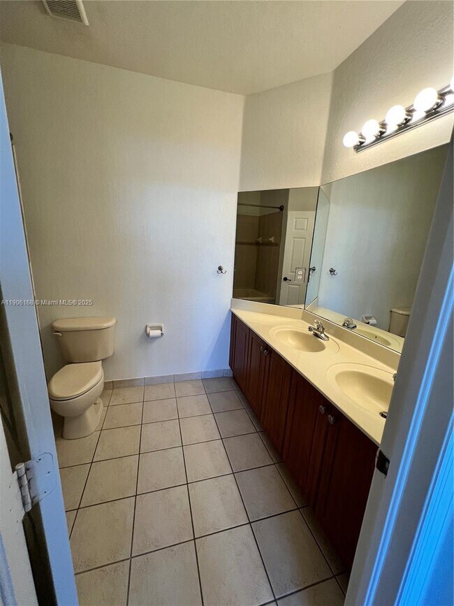 Building Photo - 10869 NW 79th St