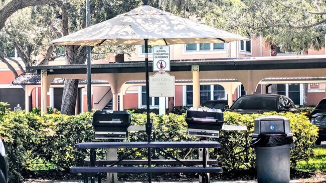 Building Photo - ANNUAL UNFURNISHED GROUND FLOOR CONDO 3 BED 2 BATH