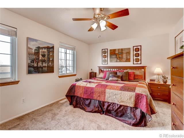 good sized master bedroom with ceiling fan, upgraded wood blinds and double closets - 7091 Beech Street