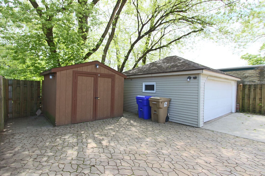 Brick Paved Patio leads to Shed for extra storage - 7021 35th Avenue