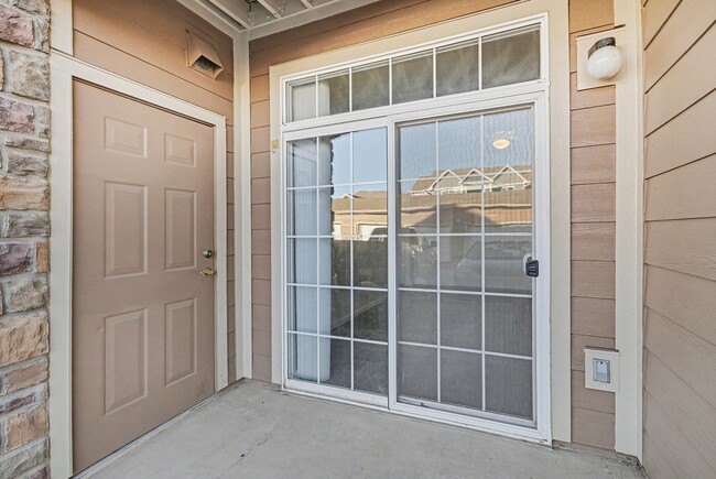 Building Photo - Bright 2-Bedroom Condo with Private Patio & Resort-Style Amenities!