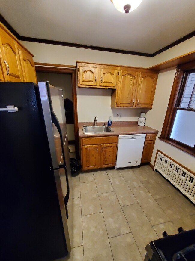 kitchen including appliances stove, fridge, microwave and dishwasher - 1312 4th Ave