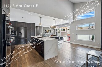 Building Photo - 7174 S Vine Cir E
