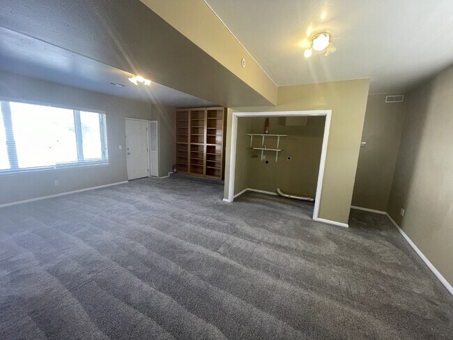 Building Photo - Spacious 6-Bed Oasis with Finished Basement & Cozy Fireplace.