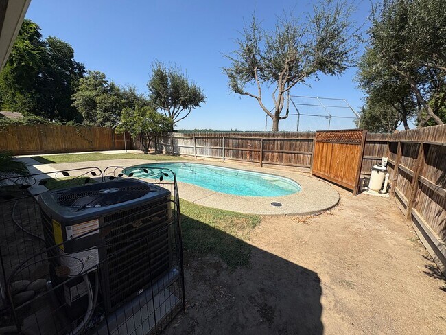 Building Photo - Beautiful home with pool Available Now!