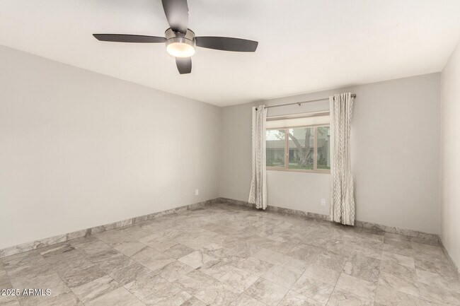 Building Photo - 8212 E Rovey Ave