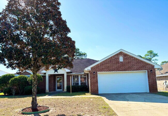 Building Photo - "Charming 4-Bed home in Navarre!"