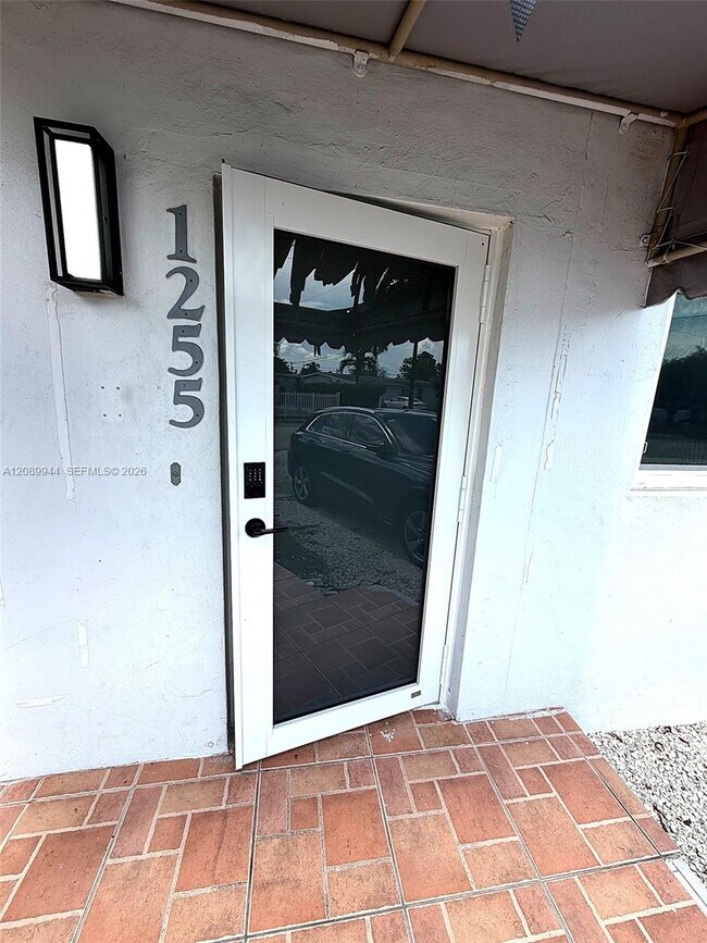 Building Photo - 1255 W 64th Terrace