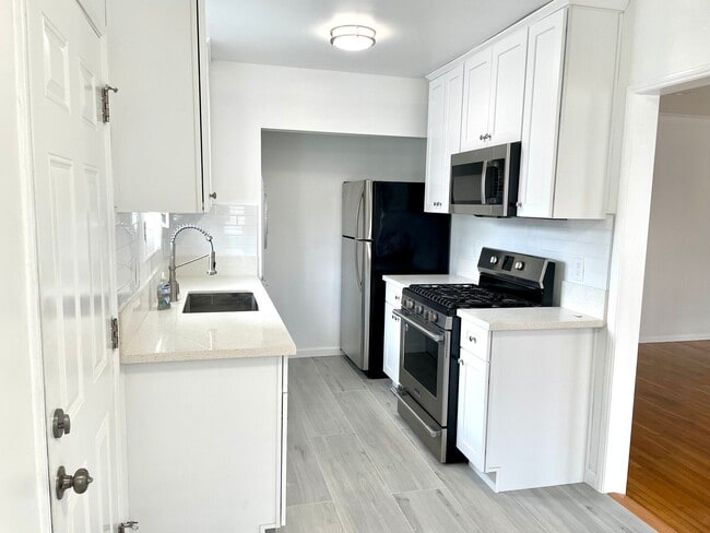 kitchen with stainless steel appliances - 3408 Pearl St