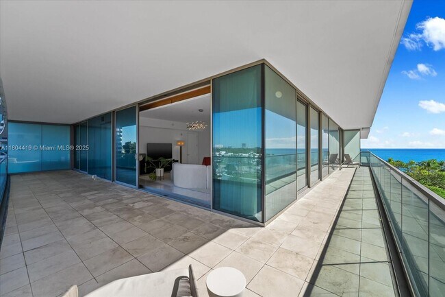 Building Photo - 10201 Collins Ave
