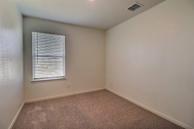 Building Photo - Move-In Ready 3-Bed Home with Solar Panels + Washer, Dryer & Refrigerator — Half Off Second Full ...