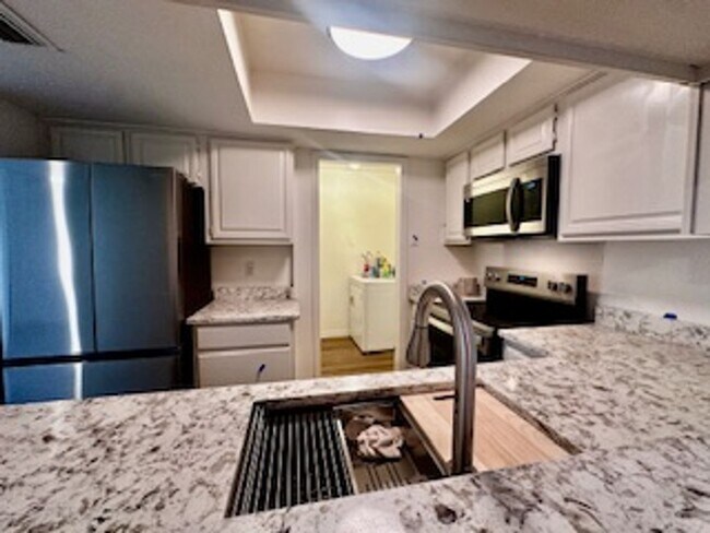 Building Photo - Renovated 2025 just steps away from community pool