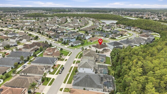Building Photo - Spacious 6-Bedroom Home Near Lake Nona | 3-Car Garage + Tesla Charger