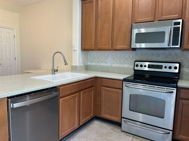 Building Photo - Charming Sawgrass Village Townhome with Pond Views & Modern Comfort