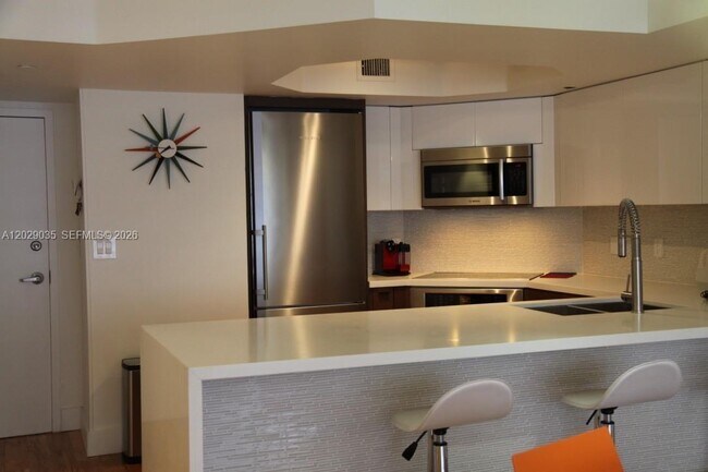 Building Photo - 8911 Collins Ave