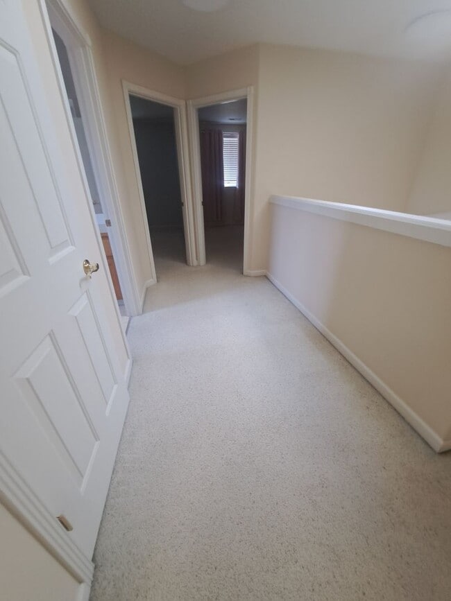 Building Photo - Beautiful setting 4 bedroom A/C Available Now