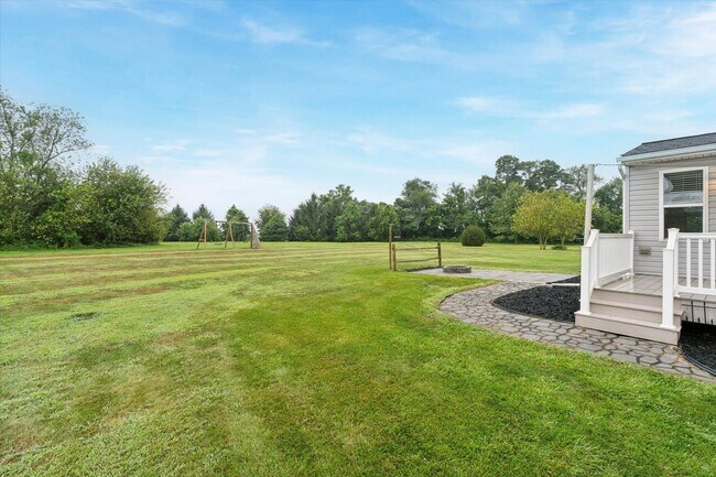 Building Photo - Spacious Single-Family Home On Over A 1/2 ...