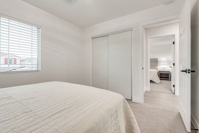 Building Photo - FULLY FURNISHED! Exudes sophistication with designer touches throughout