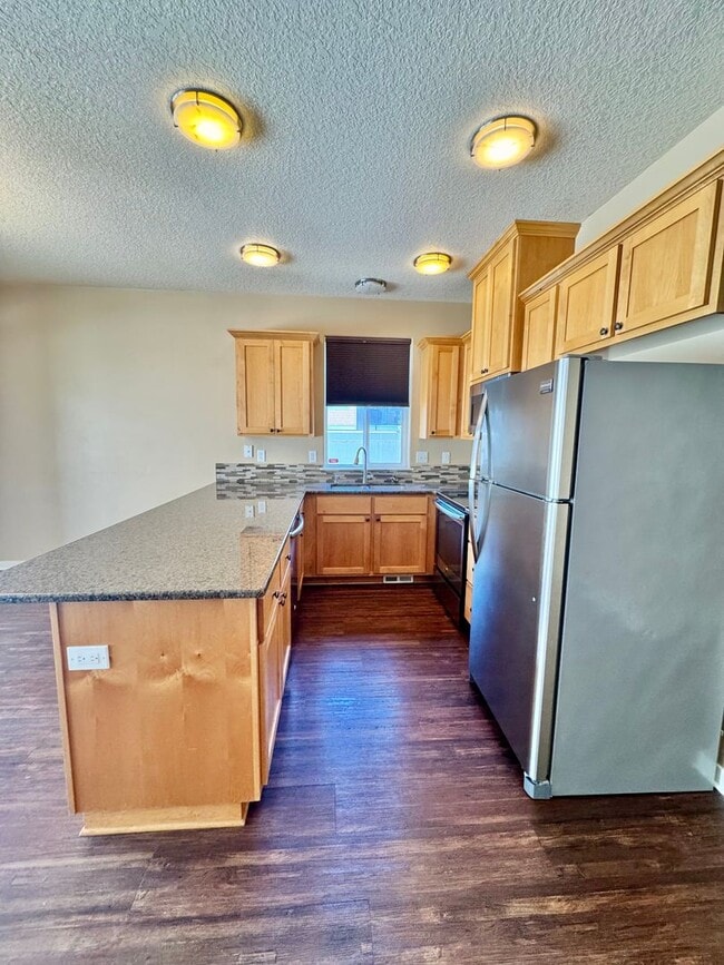 Building Photo - SHOWS WELL- Wonderful  3 Bedroom Townhome ...