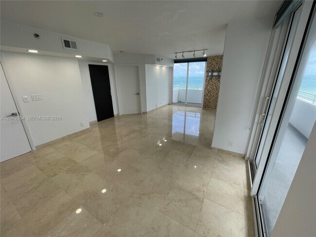 Building Photo - 8911 Collins Ave