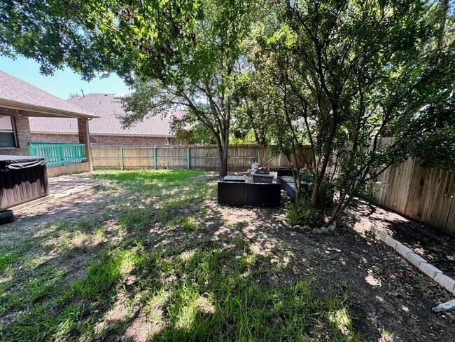 Building Photo - Ready For Move In! A Must See in Rogers Ranch - 4 Bedroom 2 Bath with Custom Features