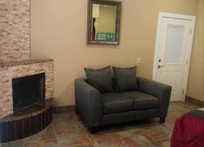 electric fireplace in living room - 1885 W Boutz Rd