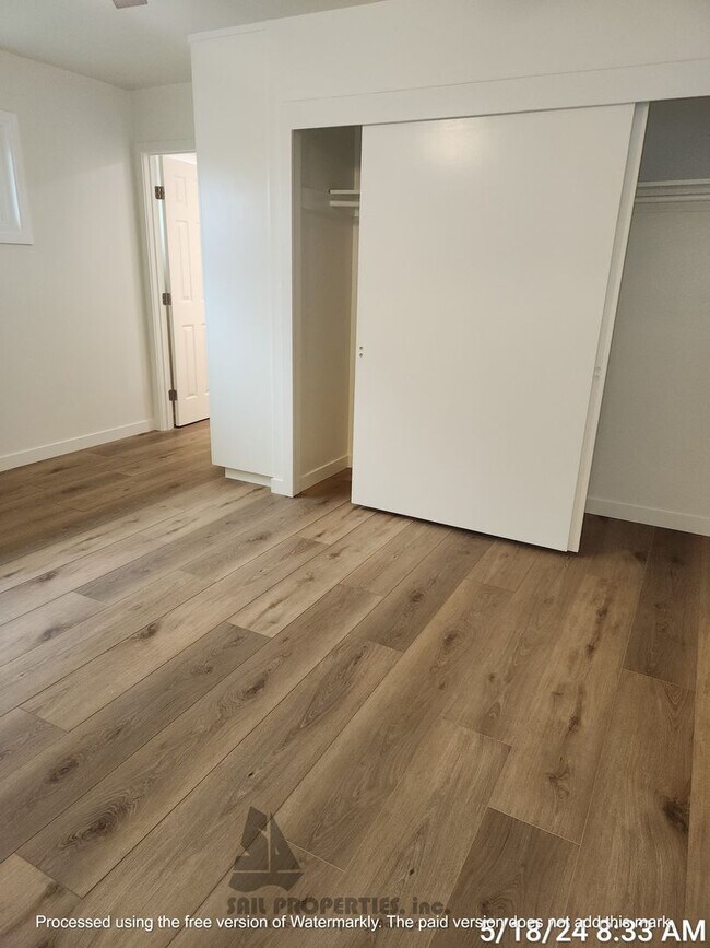 Building Photo - Welcome to this stunning 4-bedroom, 3-bath...