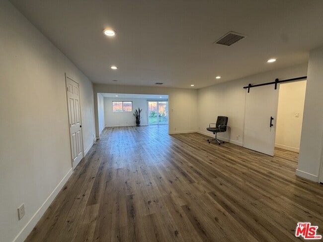 Building Photo - 8541 Dempsey Ave