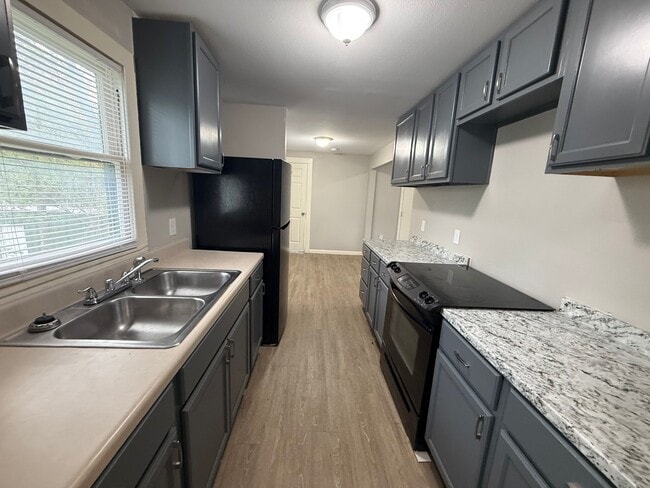 Building Photo - 130 OliveUnit 201B