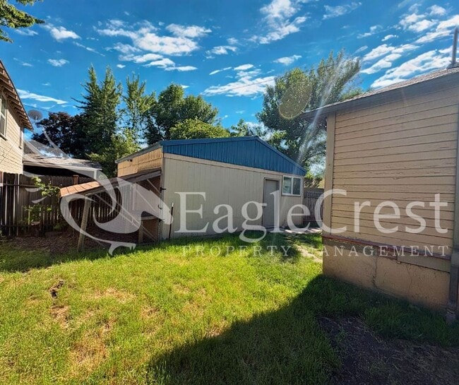 Building Photo - Charming Historic 4-Bedroom Home with Fenced Yard & Chicken Coop
