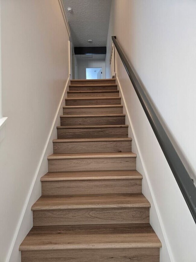 Building Photo - Nearly New, Well Appointed Modern Townhouse w 2 car attached garage