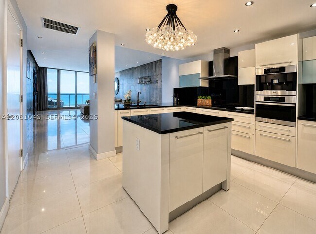 Building Photo - 17121 Collins Ave