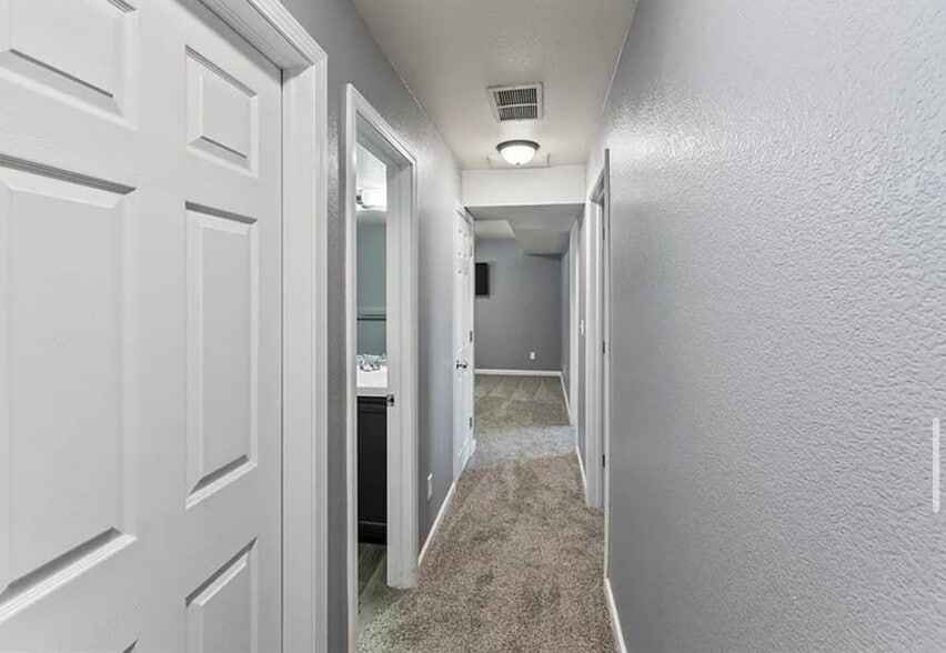 Down stairs hall way - 7390 Sue Ln