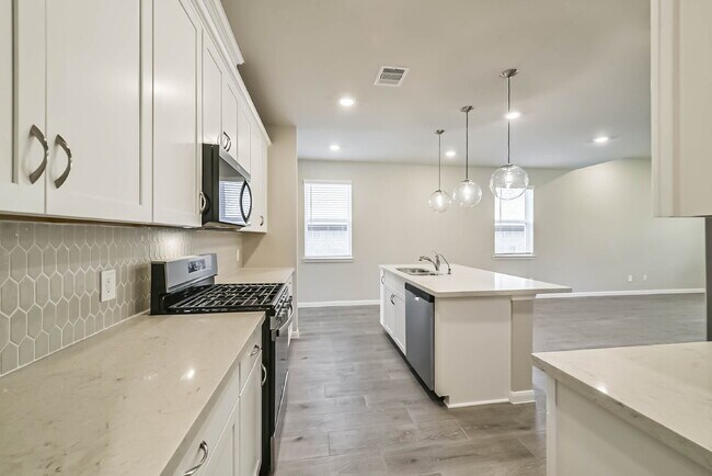 Building Photo - Experience luxury in this never-lived-in Beazer home located in the desirable Montgomery Ridge co...