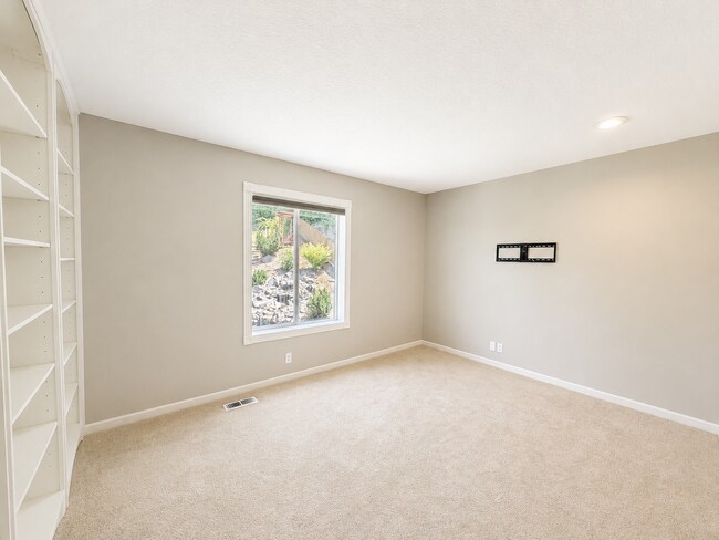 Building Photo - Light-Filled 3 Bedroom Retreat with Waterfall & Fully Fenced Yard