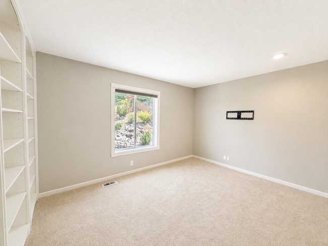 Building Photo - Light-Filled 4 Bedroom Retreat with Waterfall & Fully Fenced Yard