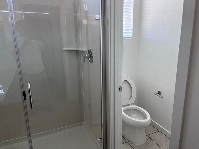 Building Photo - TOWN HOME WITH COMMUNITY POOL , GATED COMM...