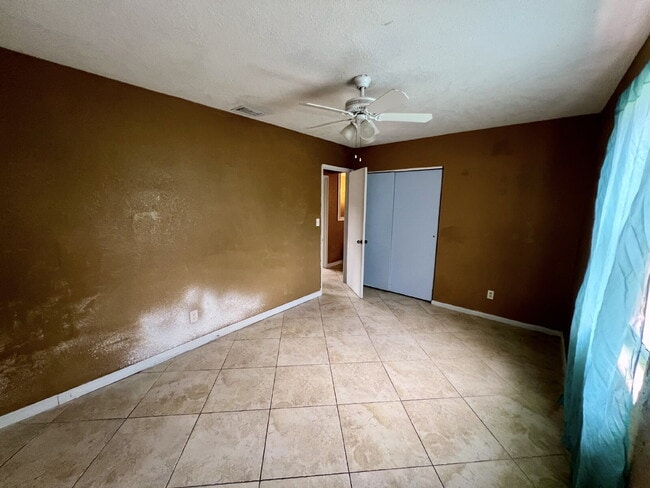 Building Photo - Spacious Master Bedroom Shared Living Spac...