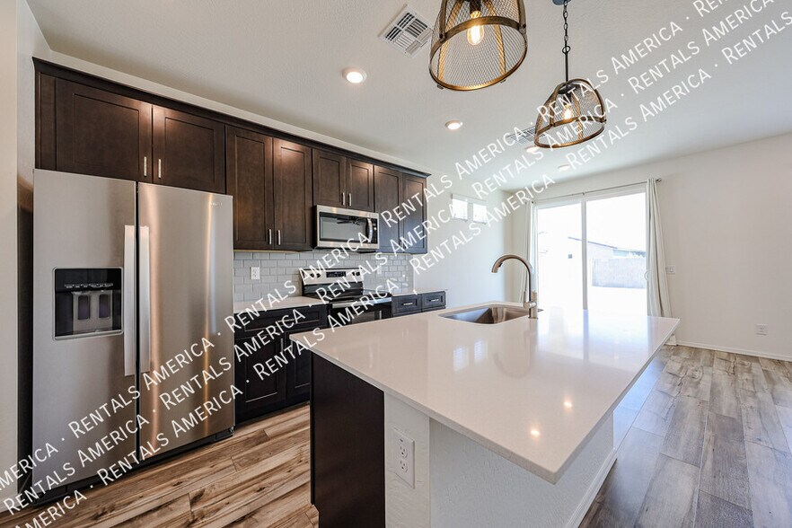 Building Photo - 18063 W Soft Wind Dr